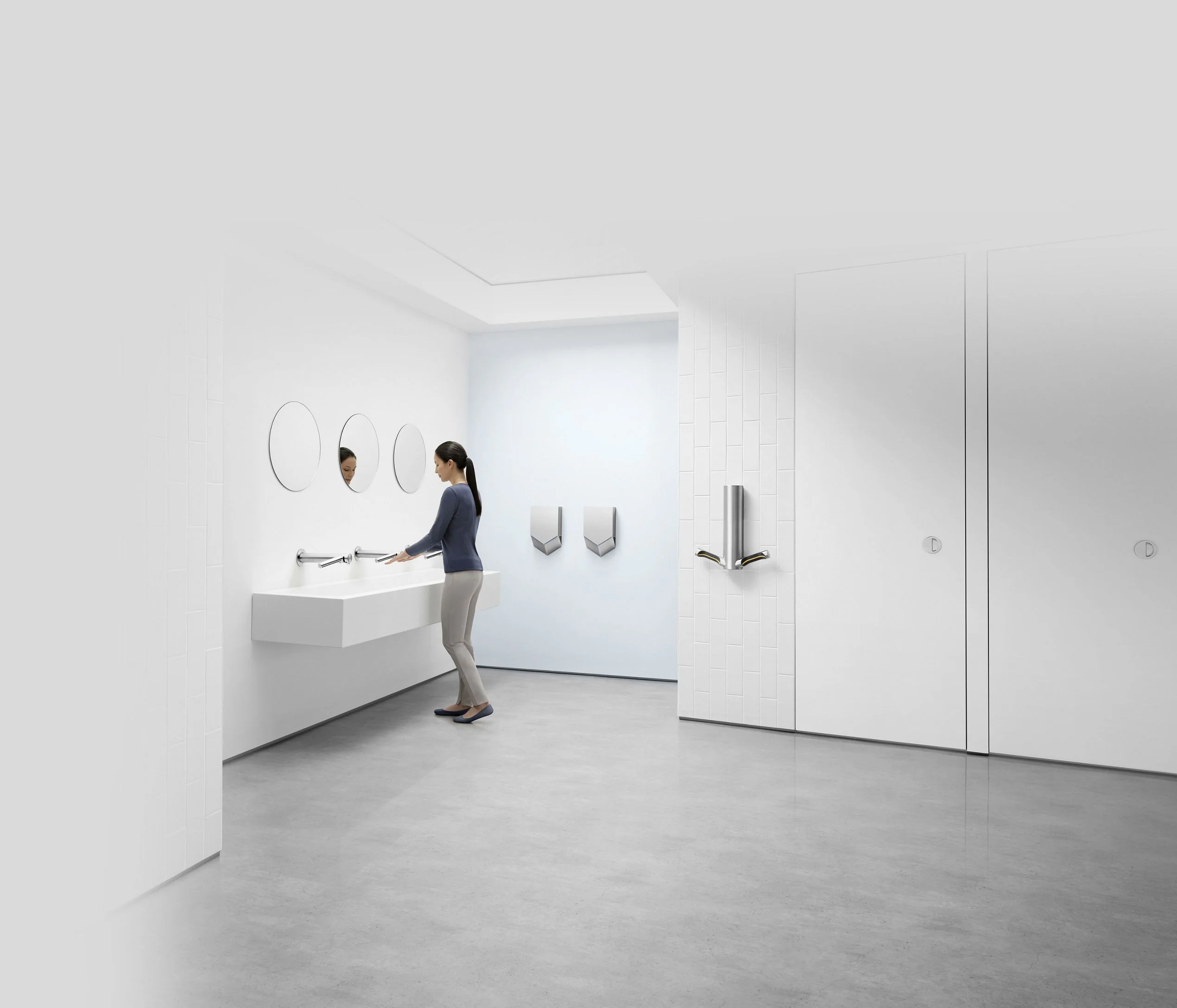 Сушилки для рук Dyson Airblade в уборной офиса